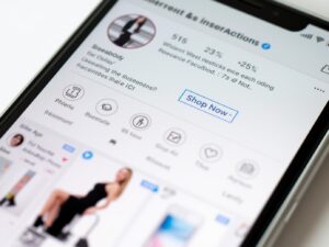 Example of Facebook and Instagram ad posts on a smartphone